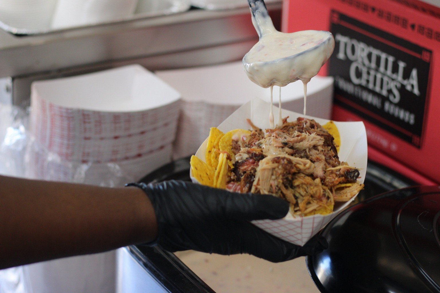 Skatts BBQ brisket nacho bar catering setup in Dallas-Fort Worth